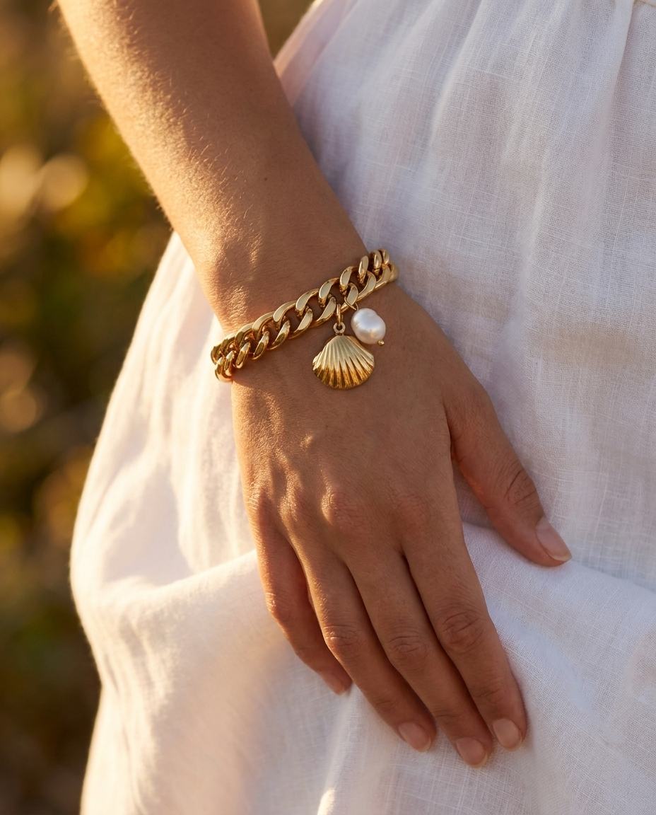 LoneHive 18K gold curb chain bracelet styled on wrist