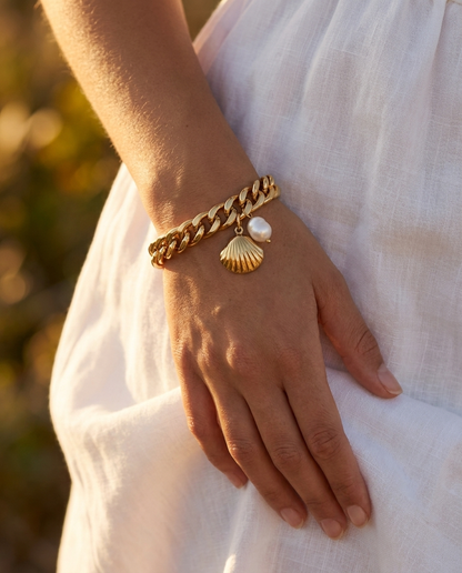 LoneHive 18K gold curb chain bracelet styled on wrist